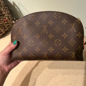 Like new Louis Vuitton GM cosmetic pouch